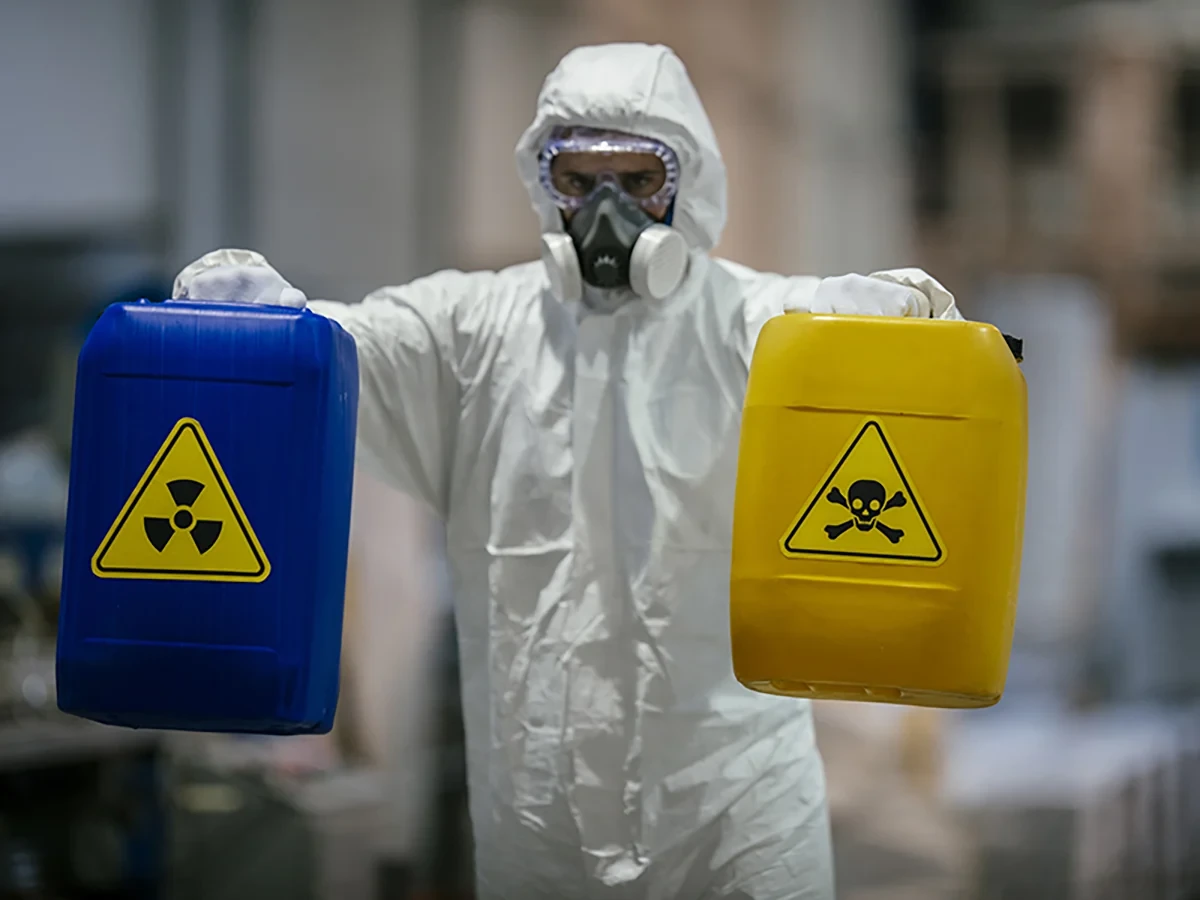 Biohazard cleanup technicians in protective equipment at a remediation scene in Issaquah, WA